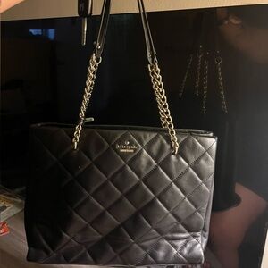 Like New Quilted Kate Spade Purse black w gold chains.
